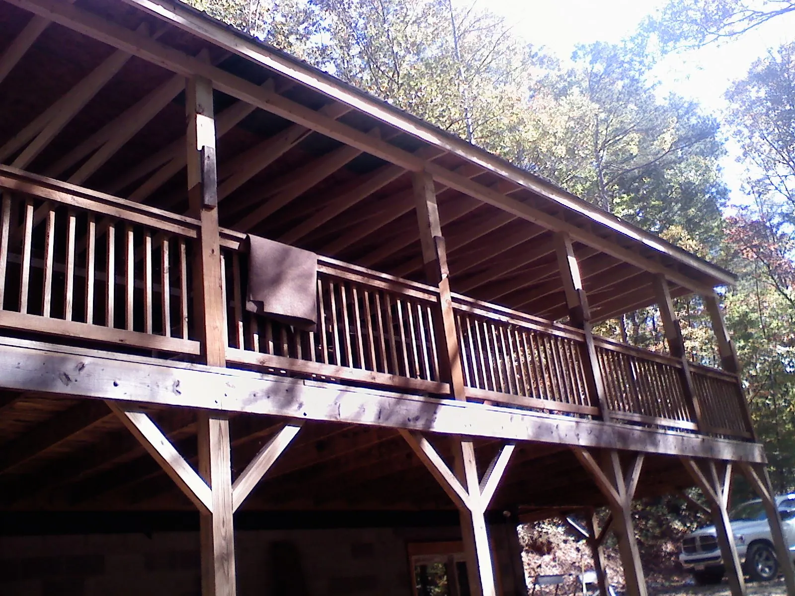 Timber framing under a new elevated porch and deck — Roof Leak Repair in Bernalillo by Roofing Brothers